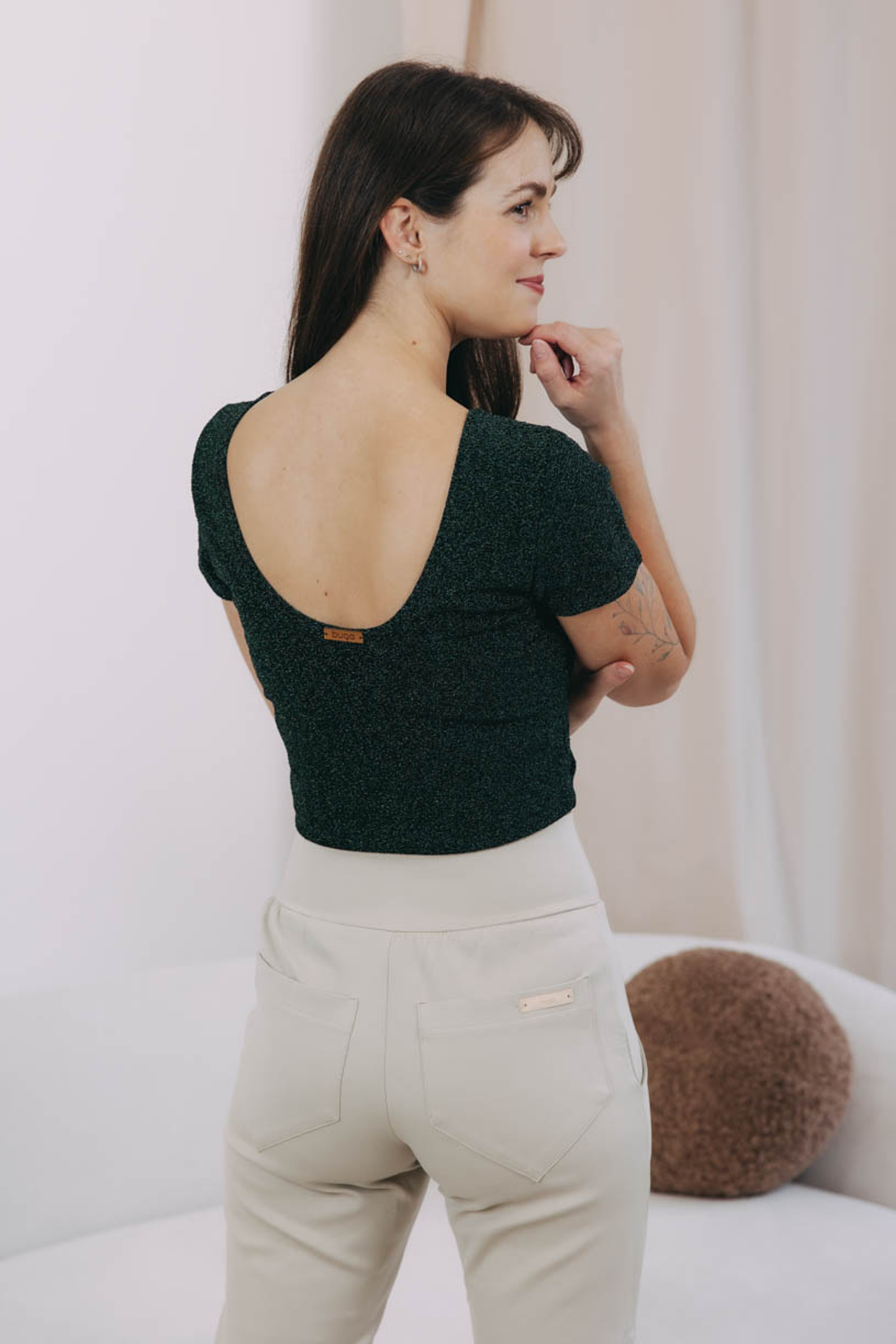Káťa má na sobě při své výšce 170 cm velikost XS.