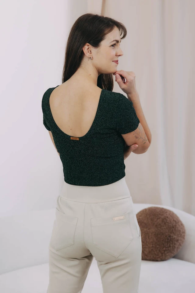 Káťa má na sobě při své výšce 170 cm velikost XS.