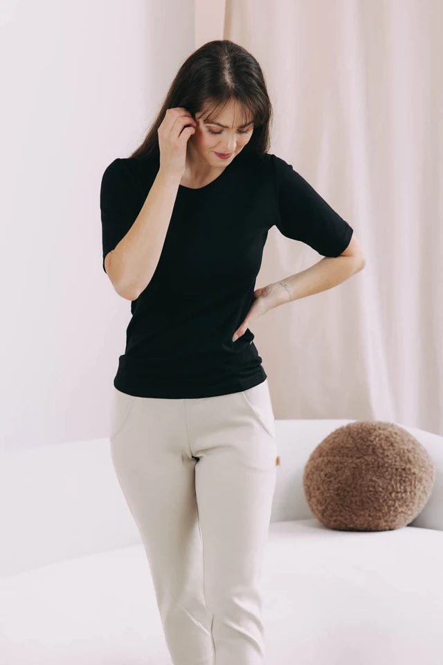 Káťa má na sobě při své výšce 170 cm velikost XS.